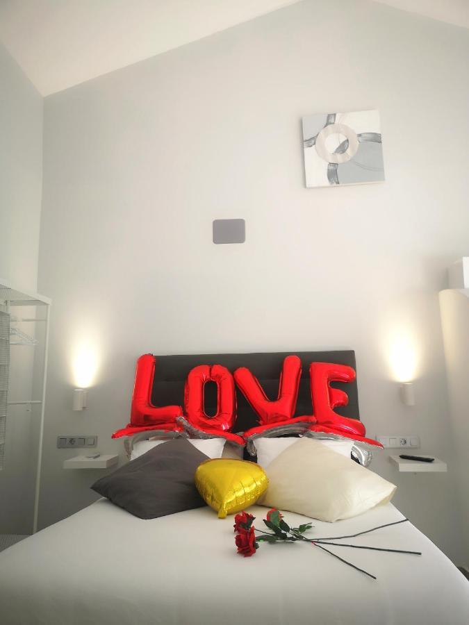 Eres Emerita "Apartamentos & Suites" Merida Bagian luar foto