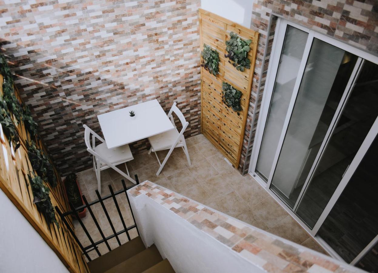 Eres Emerita "Apartamentos & Suites" Merida Bagian luar foto